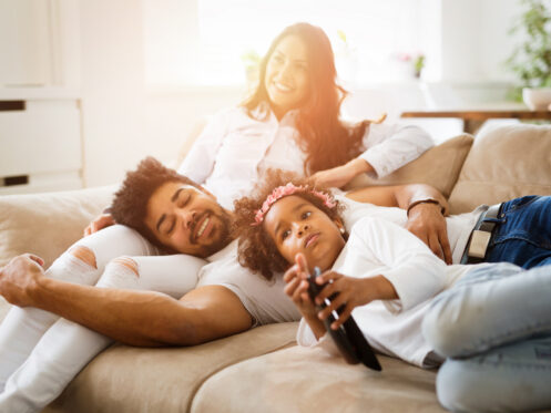 A family relaxing comfortably in their DFW home